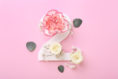 Paper number 2, eucalyptus leaves and beautiful flowers on pink background, flat lay