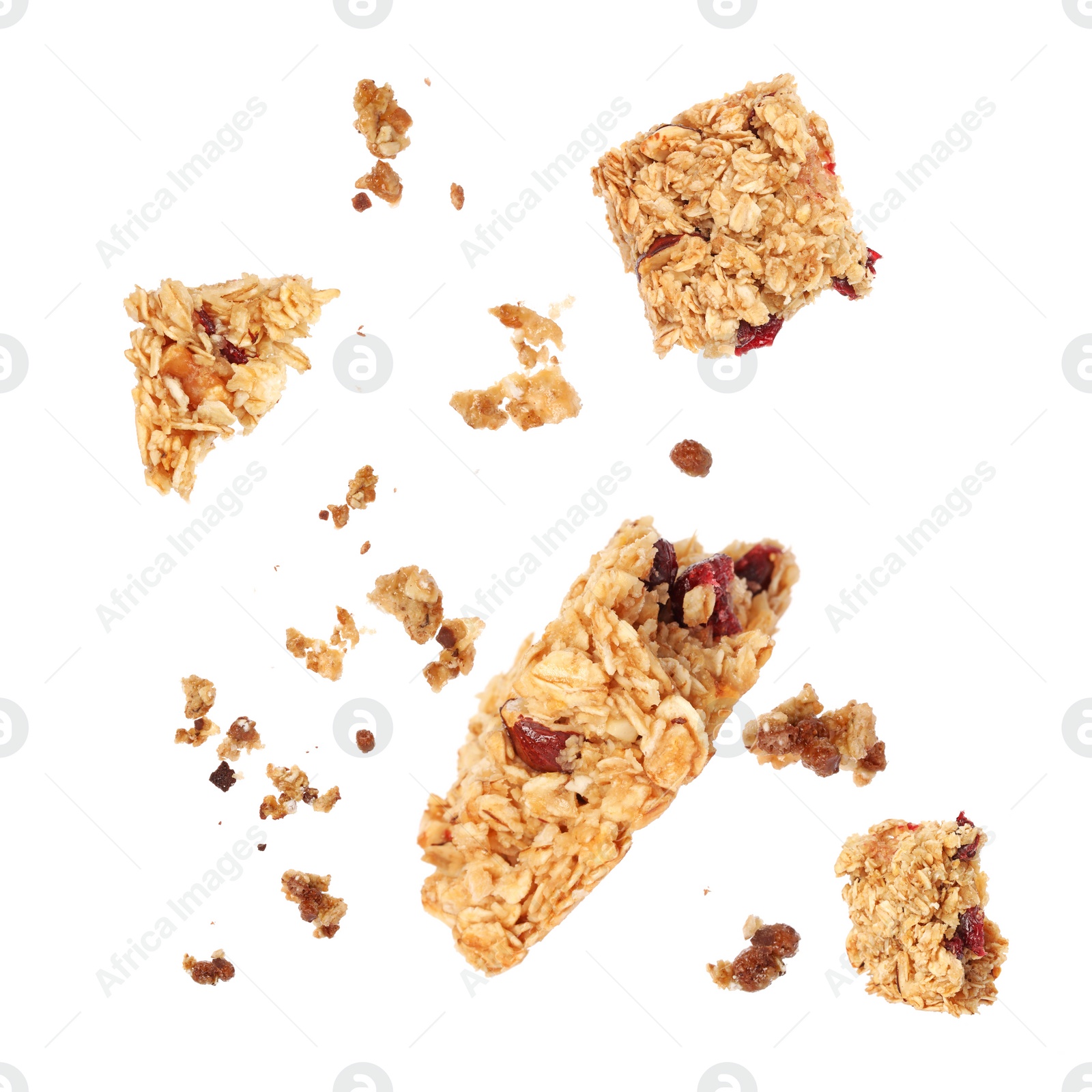 Image of Granola bar breaking in air on white background