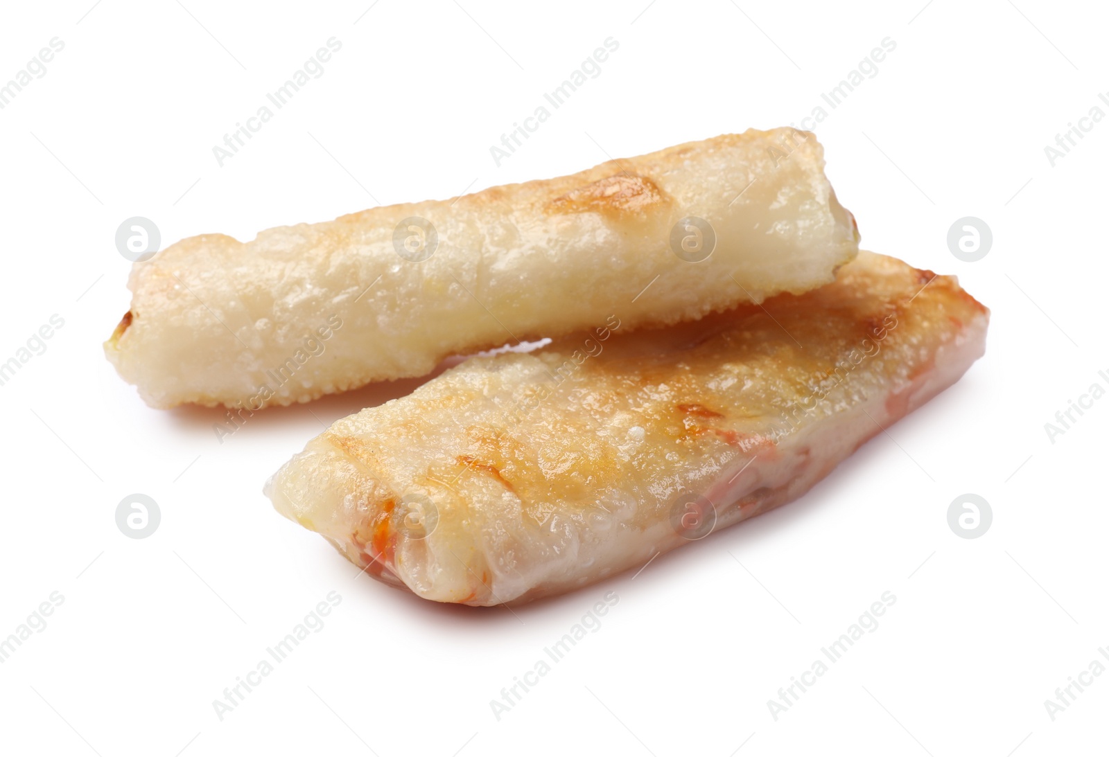 Photo of Delicious fried spring rolls isolated on white