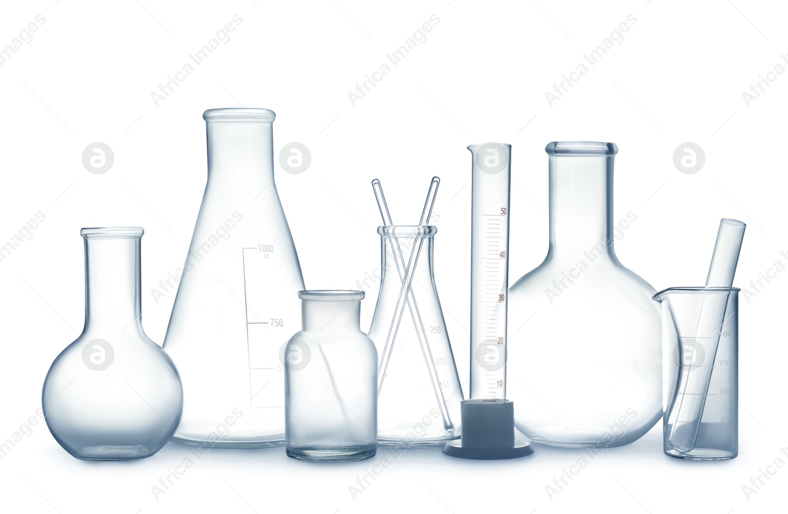 Photo of Empty clean laboratory glassware on white background