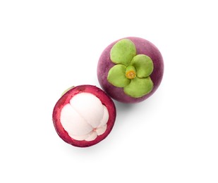 Delicious ripe mangosteen fruits on white background, top view