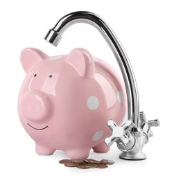 Photo of Water scarcity concept. Piggy bank, tap and coins isolated on white