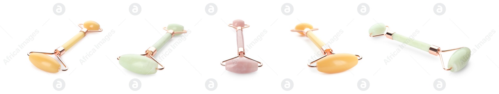 Image of Set with natural crystal face rollers on white background. Banner design