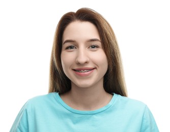 Photo of Portrait of smiling woman with dental braces on white background