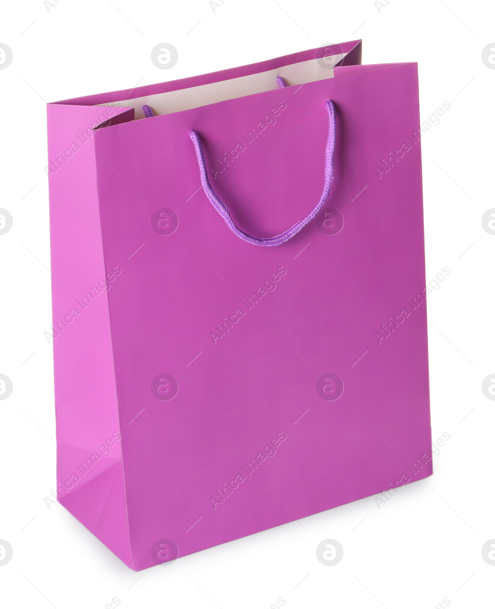 Photo of One violet shopping bag isolated on white