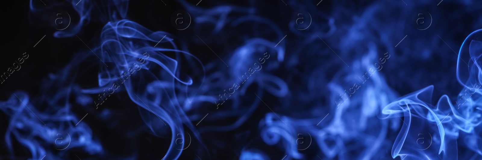 Image of Blue smoke on black background, closeup. Banner design