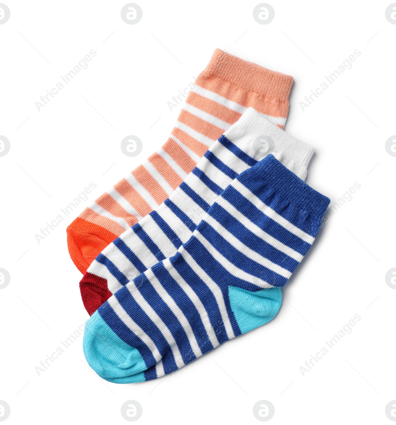 Photo of Cute child socks on white background, top view