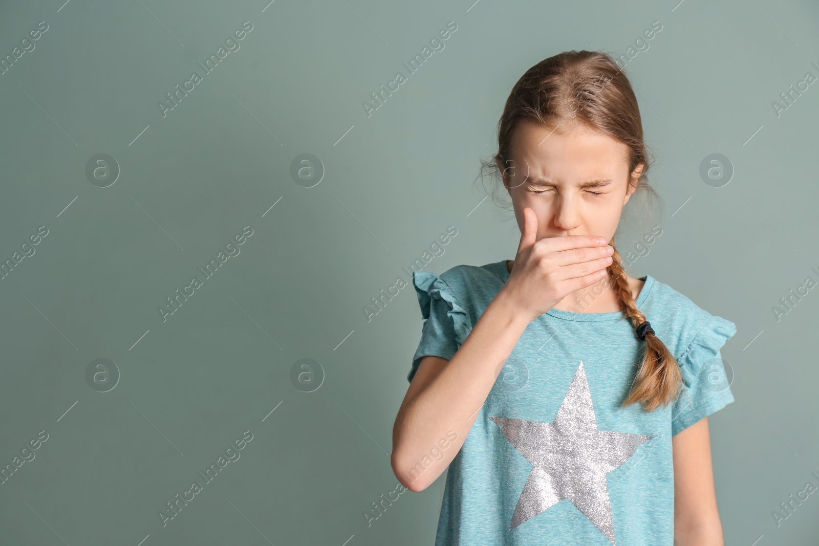 Photo of Girl coughing on color background