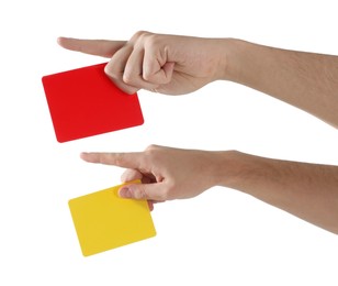 Photo of Referee holding cards and pointing on white background, closeup