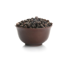 Photo of Bowl with black pepper grains on white background