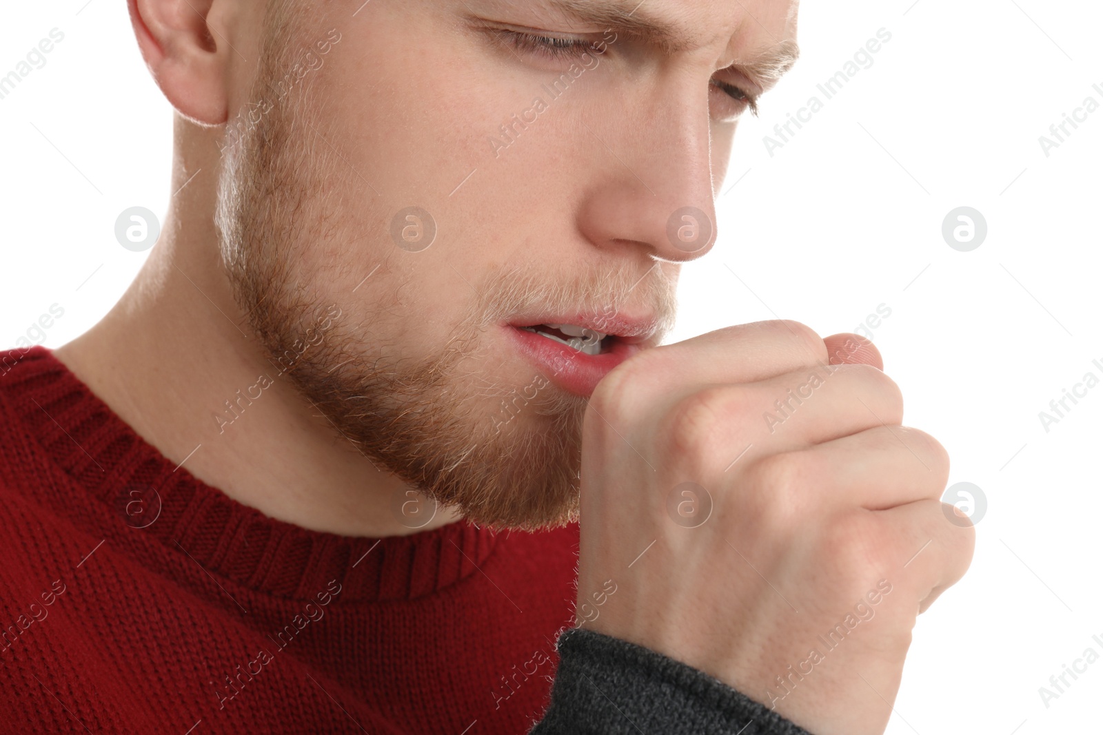 Photo of Handsome young man coughing against white background