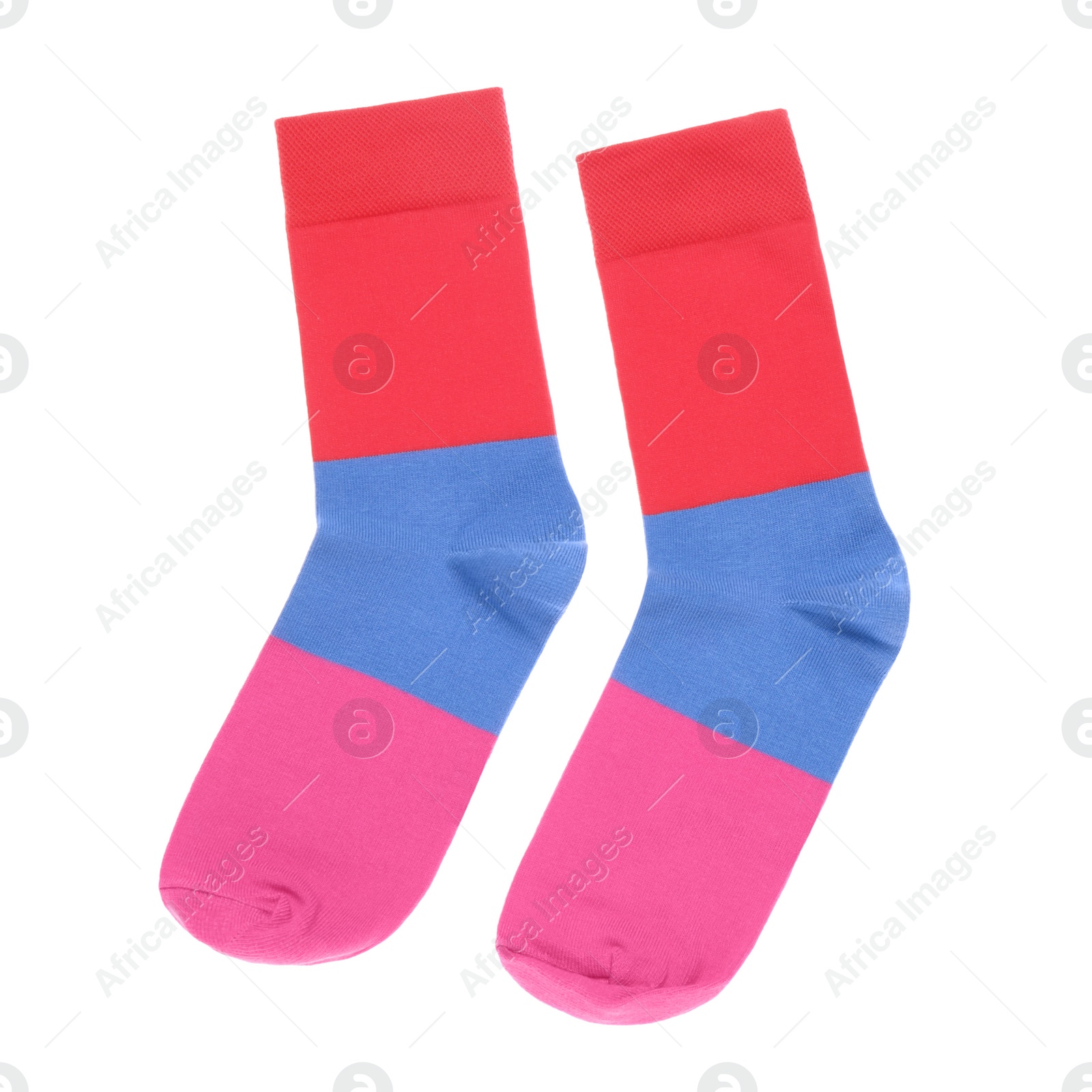 Photo of Colorful striped socks on white background, top view