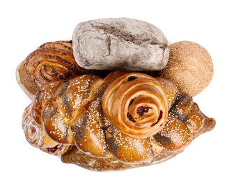 Fresh breads and pastries on white background, top view