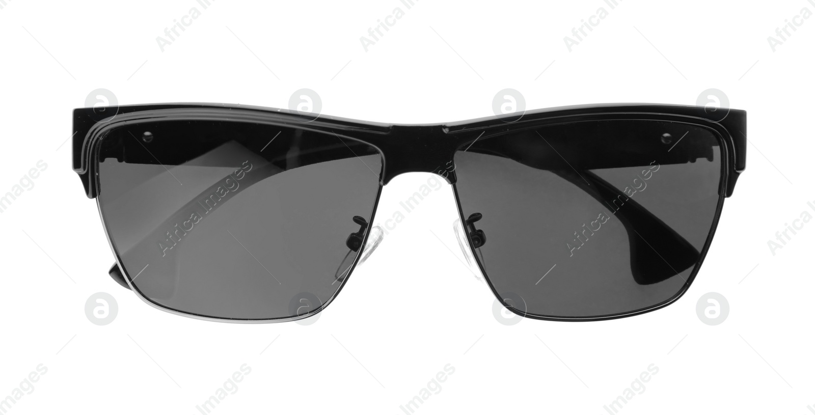 Photo of New stylish elegant sunglasses isolated on white