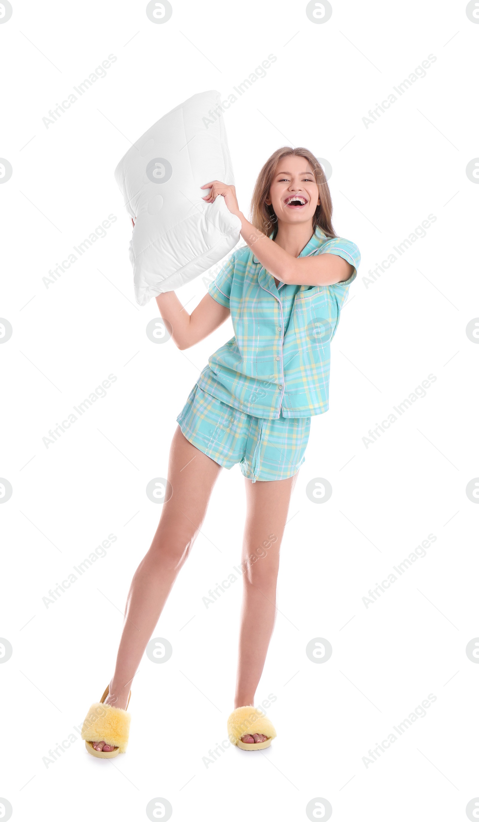 Photo of Happy woman in pajamas with pillow on white background