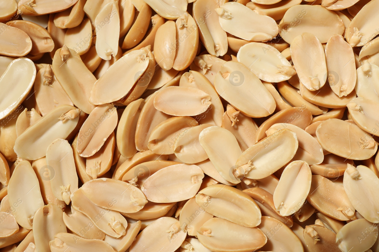 Photo of Fresh peeled peanuts as background, top view