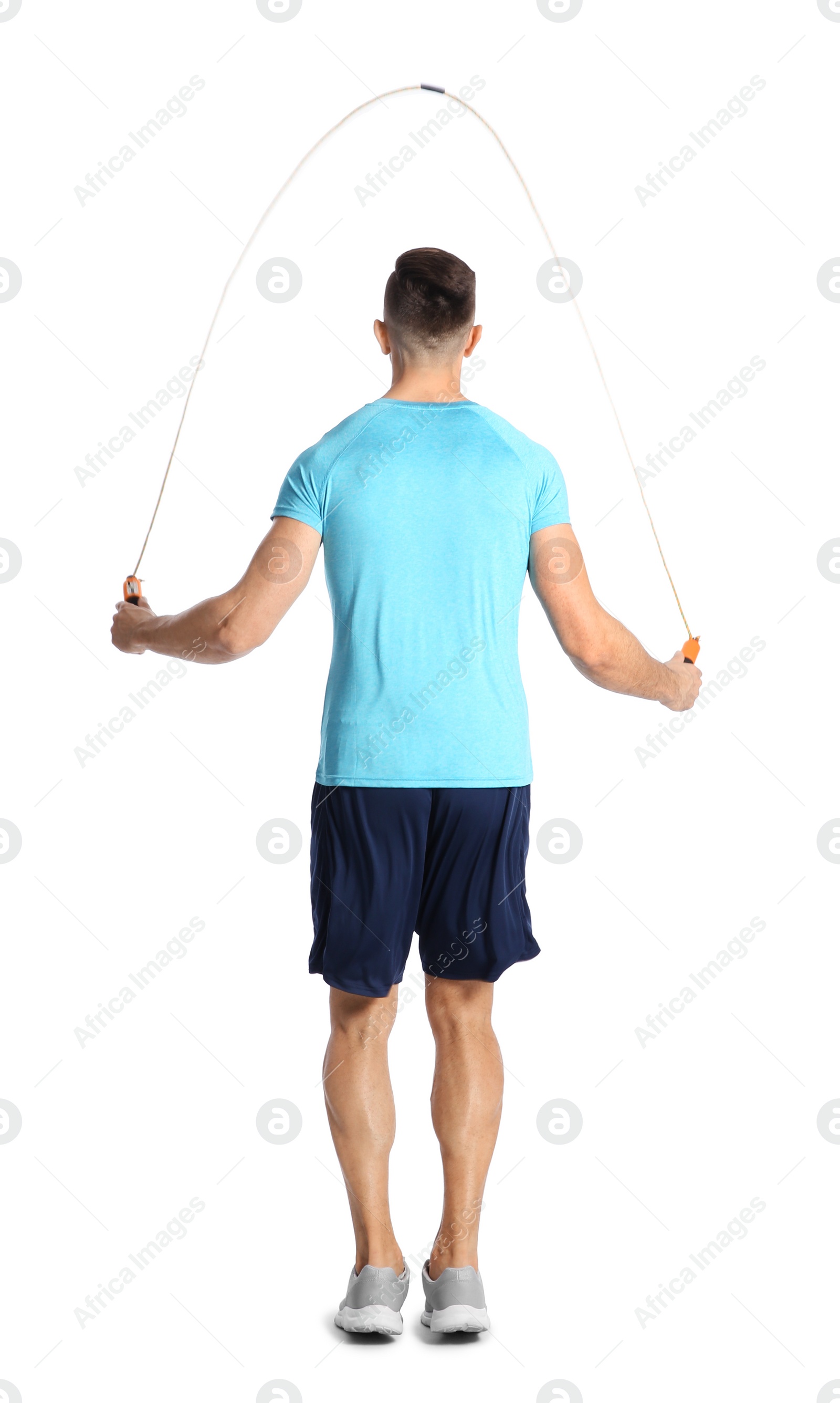 Photo of Sportive man training with jump rope on white background