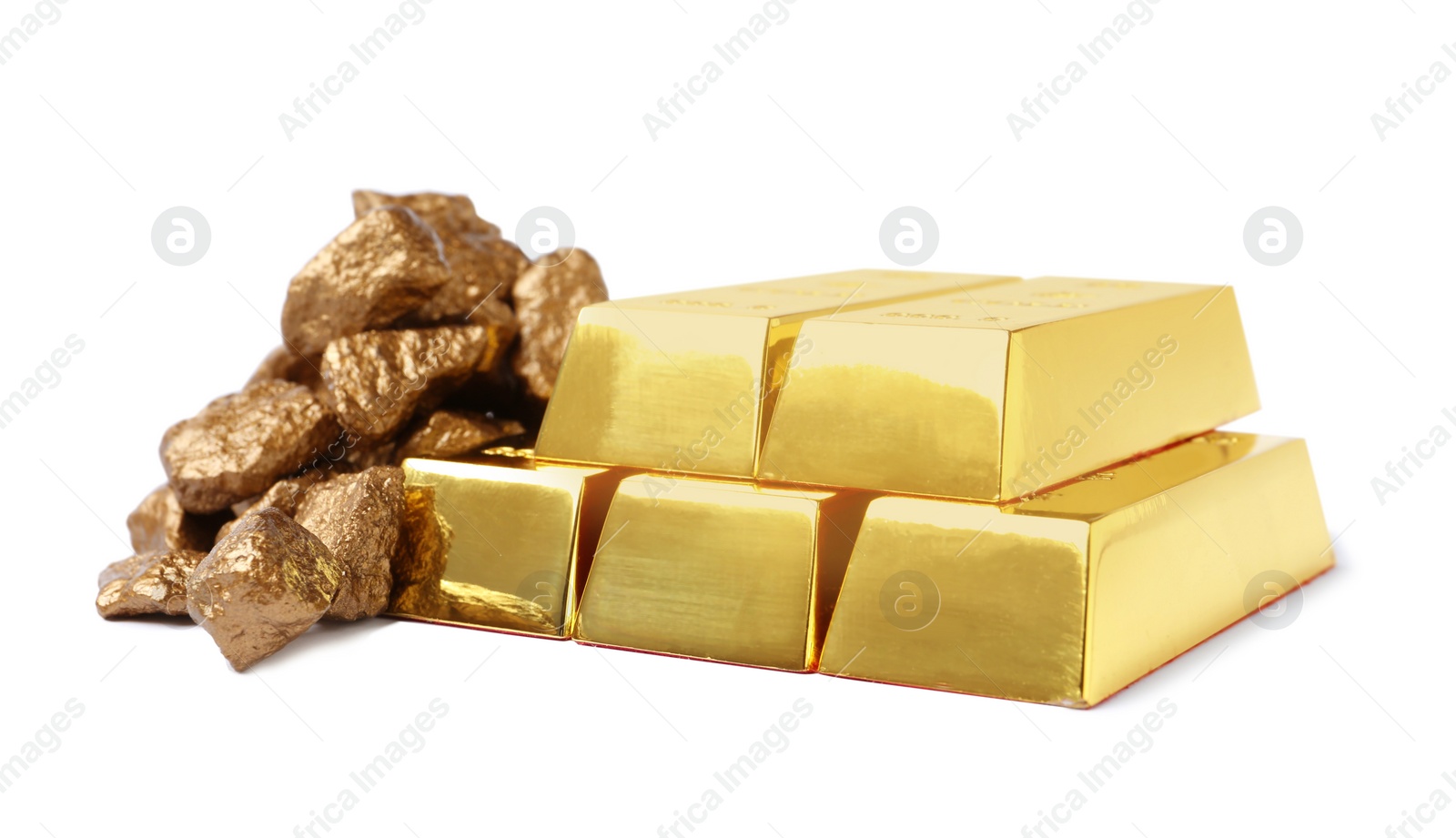 Photo of Shining gold bars and lumps isolated on white