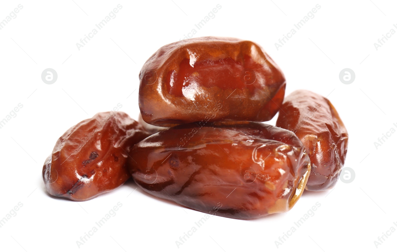 Photo of Heap of tasty sweet dried dates on white background