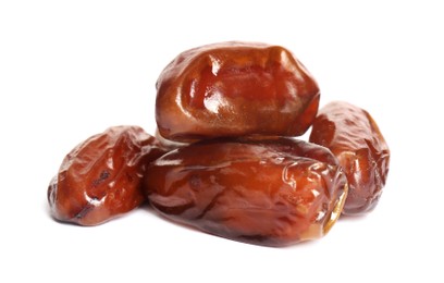 Photo of Heap of tasty sweet dried dates on white background