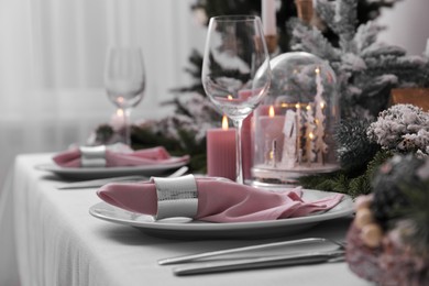 Photo of Beautiful festive table setting with Christmas decor indoors, space for text