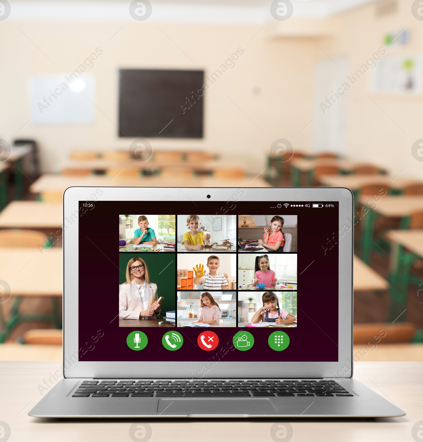 Image of Distance education during quarantine and lockdown due to Covid-19 pandemic. Modern laptop displaying online school lesson in classroom