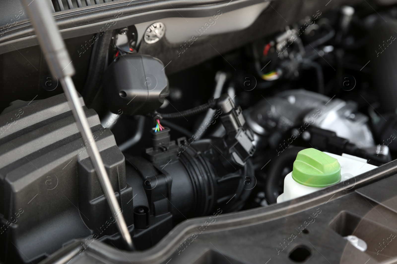 Photo of Closeup view of engine bay in modern car