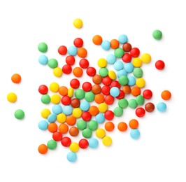 Photo of Many small colorful candies on white background, top view