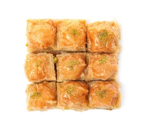 Photo of Delicious baklava with pistachios isolated on white, top view