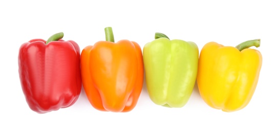 Photo of Fresh ripe bell peppers on white background, top view