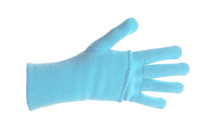 Photo of Woman wearing blue glove on white background, closeup. Autumn clothes