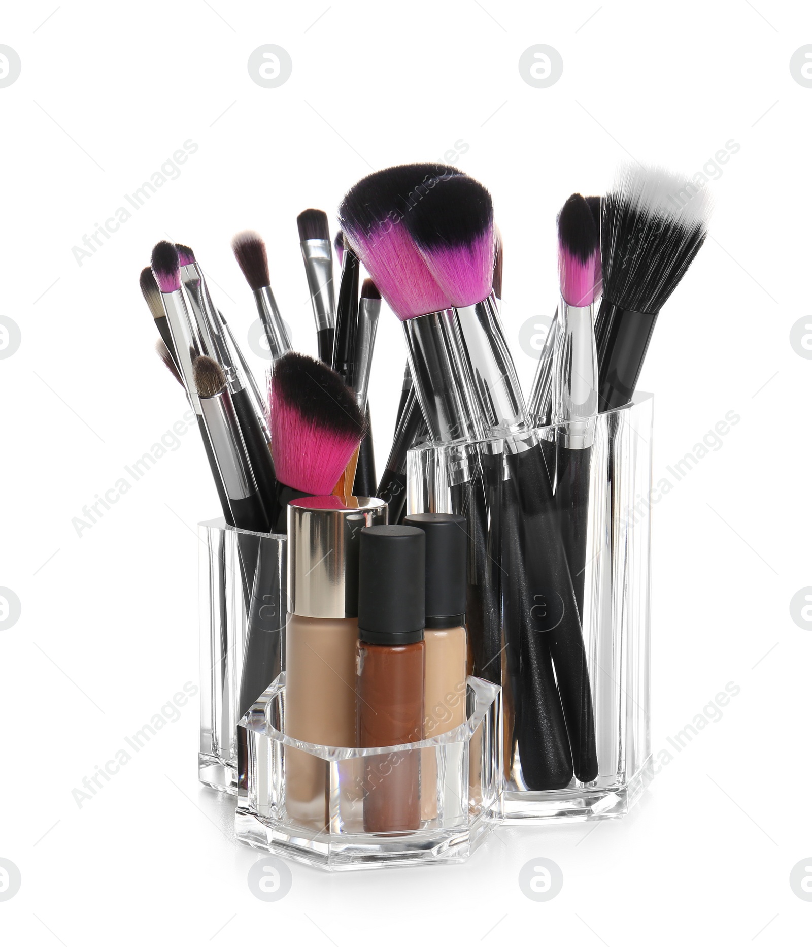 Photo of Set of makeup cosmetic products in organizer on white background