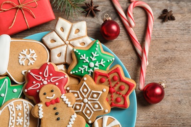 Photo of Composition with tasty homemade Christmas cookies on wooden table