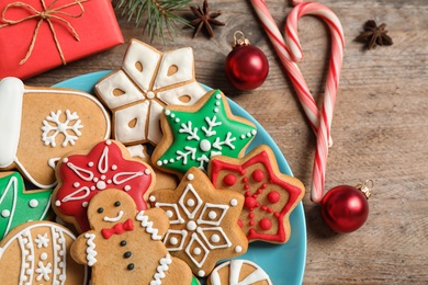 Composition with tasty homemade Christmas cookies on wooden table