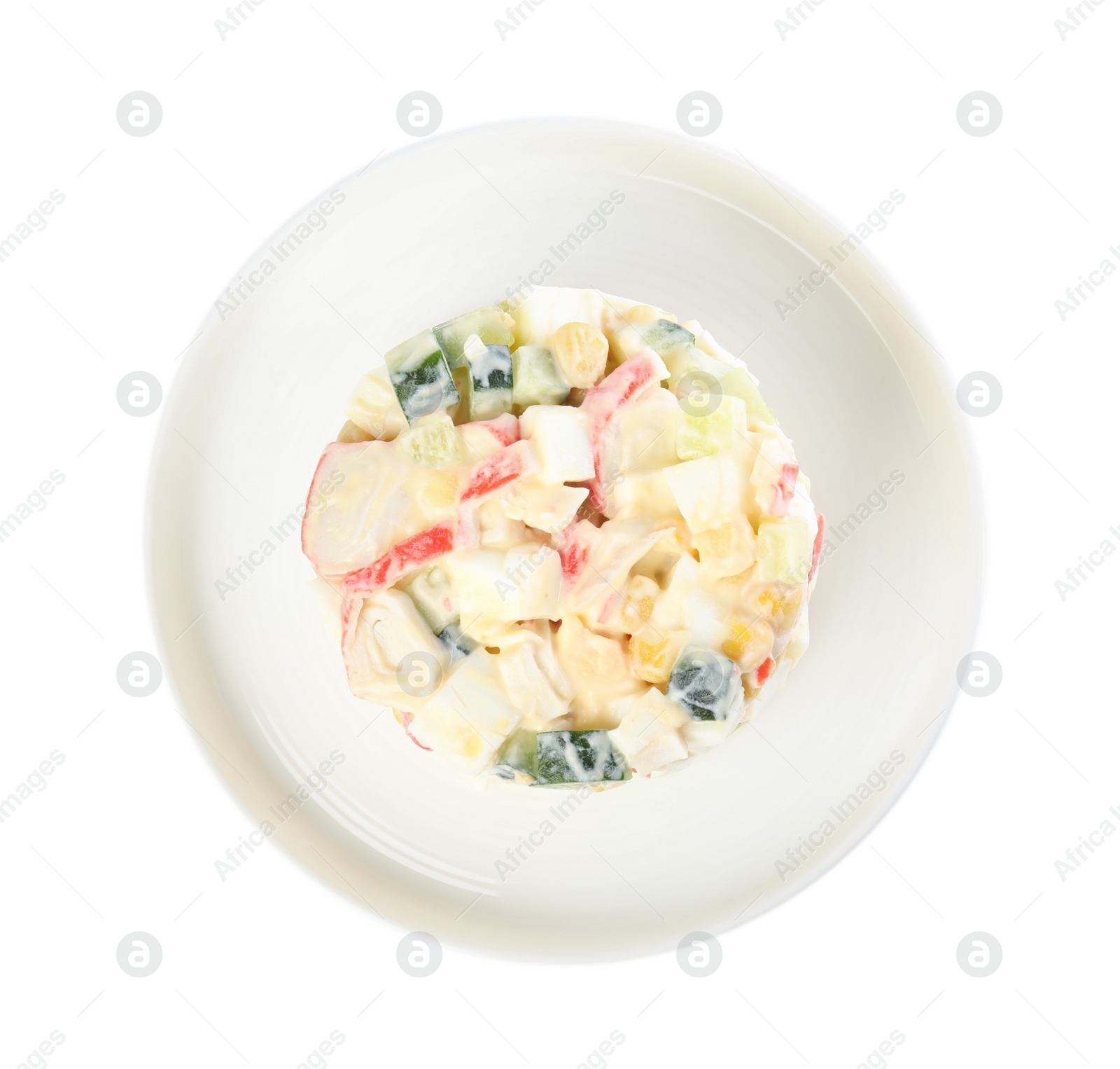 Photo of Delicious salad with fresh crab sticks on white background, top view