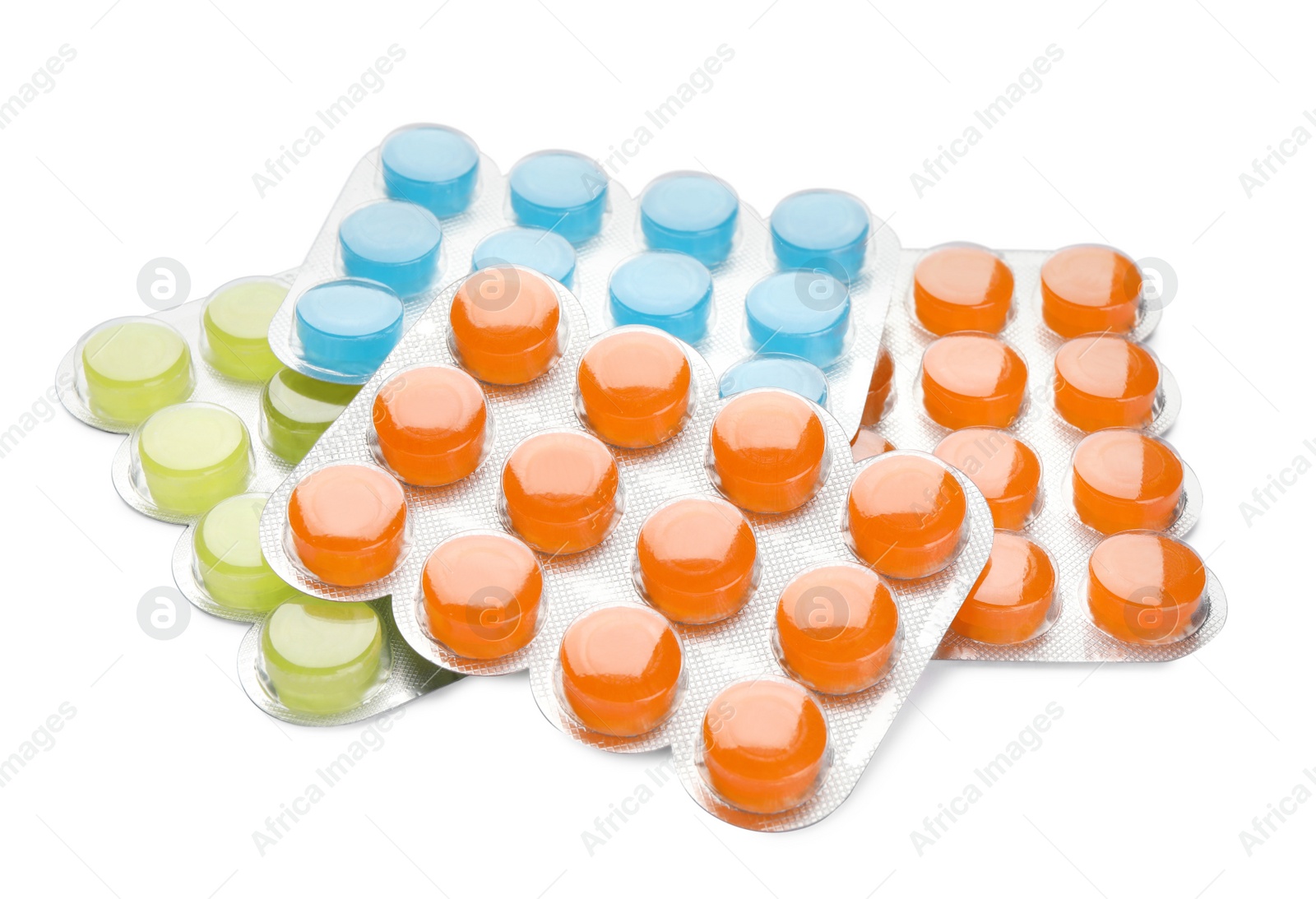 Photo of Blisters with colorful cough drops on white background