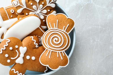 Delicious Christmas cookies on light table, top view