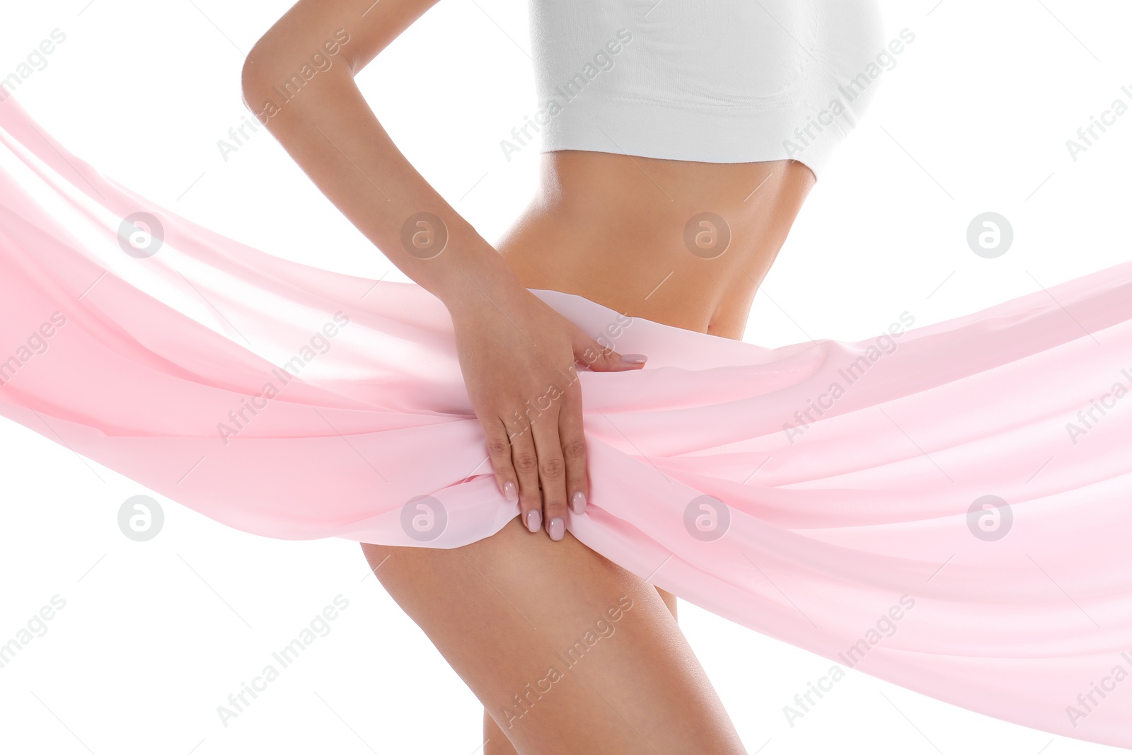 Photo of Young woman covering her body with silk fabric on white background, closeup. Beauty care