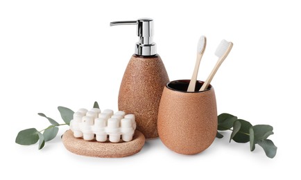 Photo of Bath accessories. Different personal care products and eucalyptus branches isolated on white