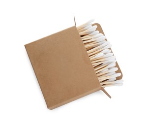 Photo of Cardboard box with cotton buds isolated on white, above view