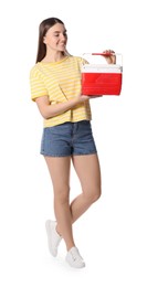 Photo of Happy young woman with plastic cool box isolated on white