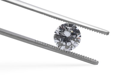 Tweezers with beautiful shiny diamond isolated on white