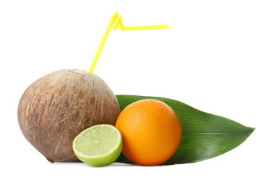 Photo of Composition of brown coconut with citrus fruits on white background