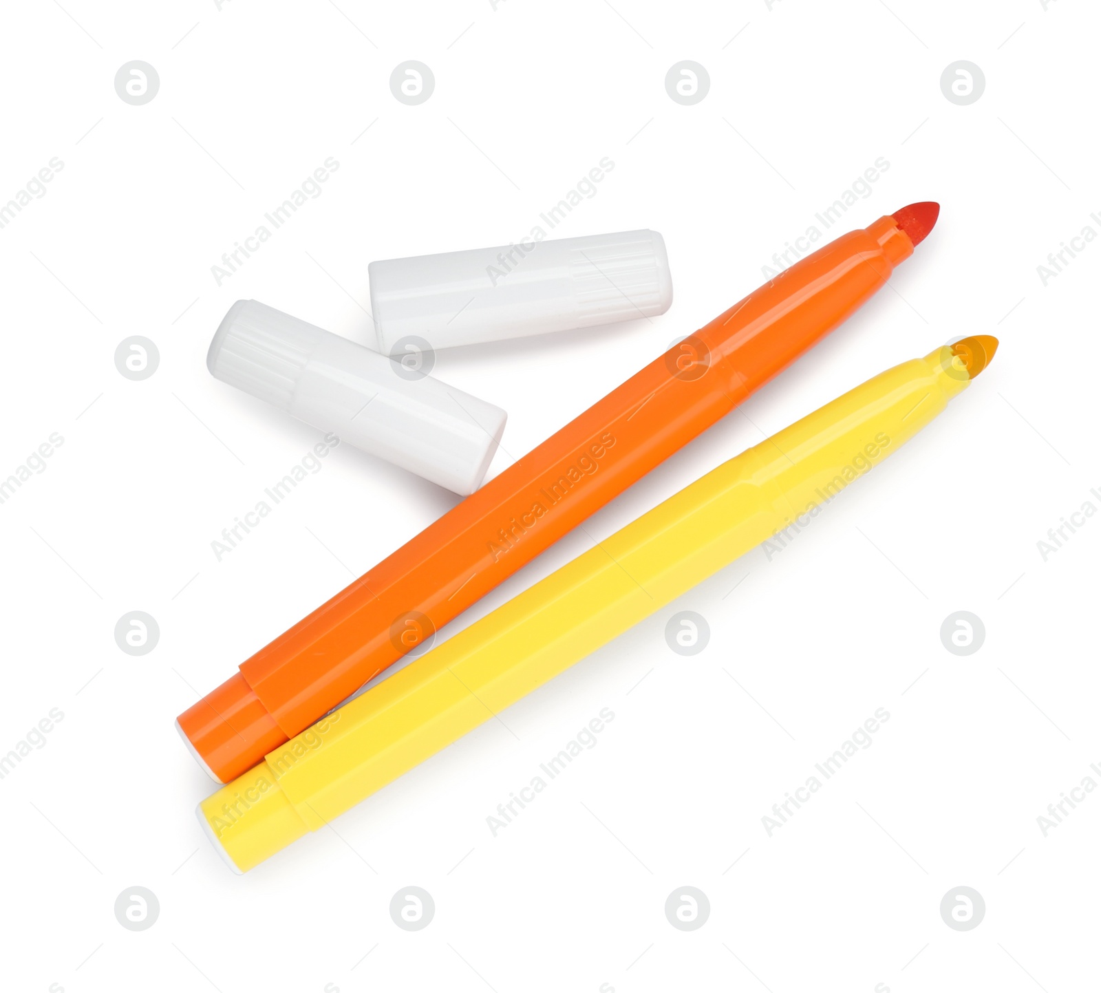 Photo of Colorful markers and caps on white background, top view