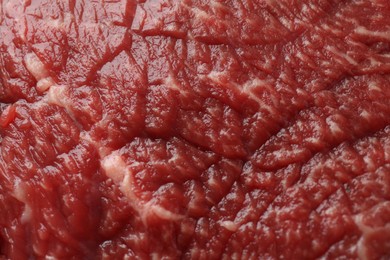 Photo of Texture of fresh beef meat as background, closeup