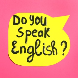 Photo of Paper speech bubble with question Do You Speak English on pink background, top view