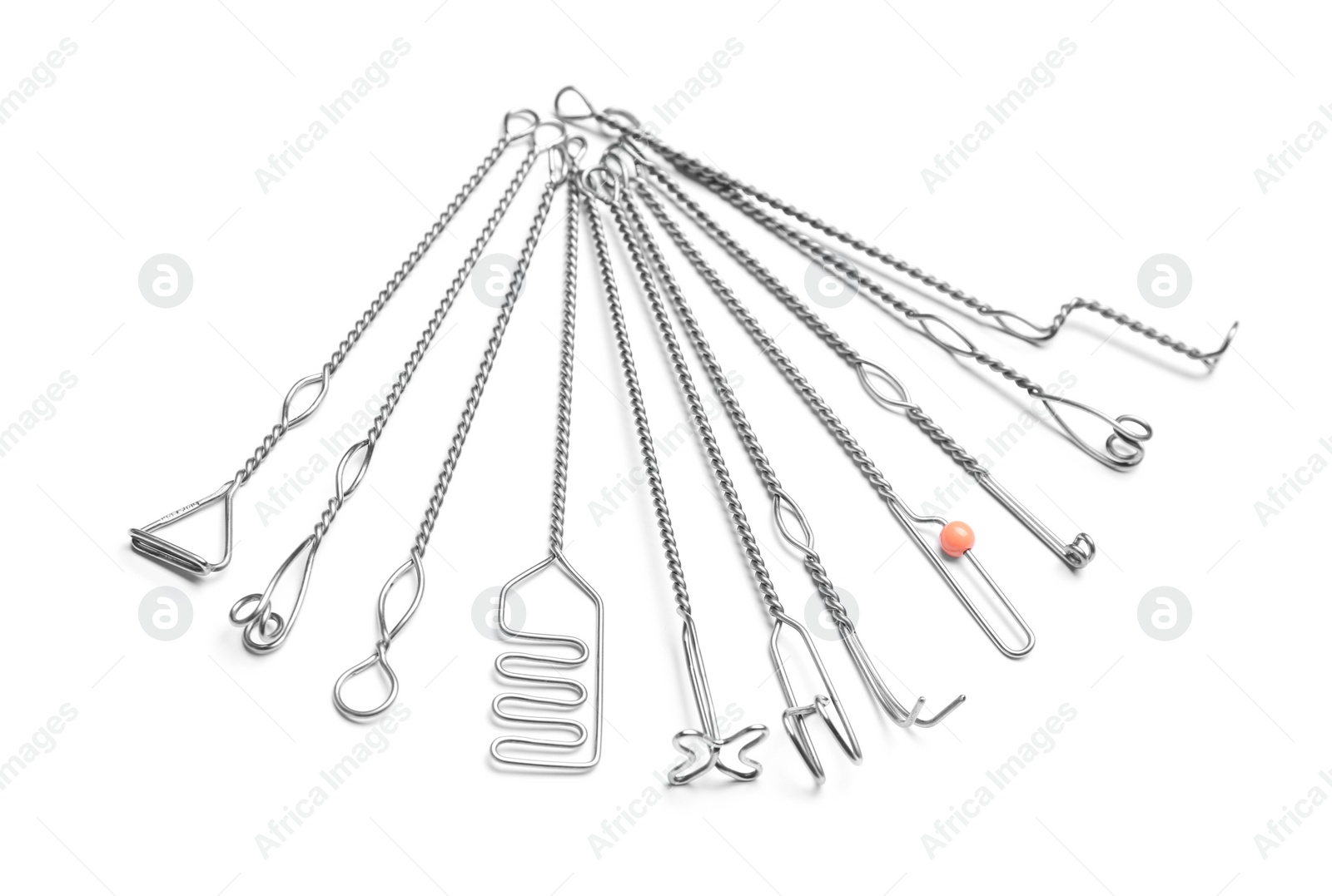 Photo of Set of logopedic probes for speech therapy on white background