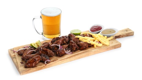 Wooden board with tasty roasted chicken wings, french fries, mug of beer and sauces isolated on white