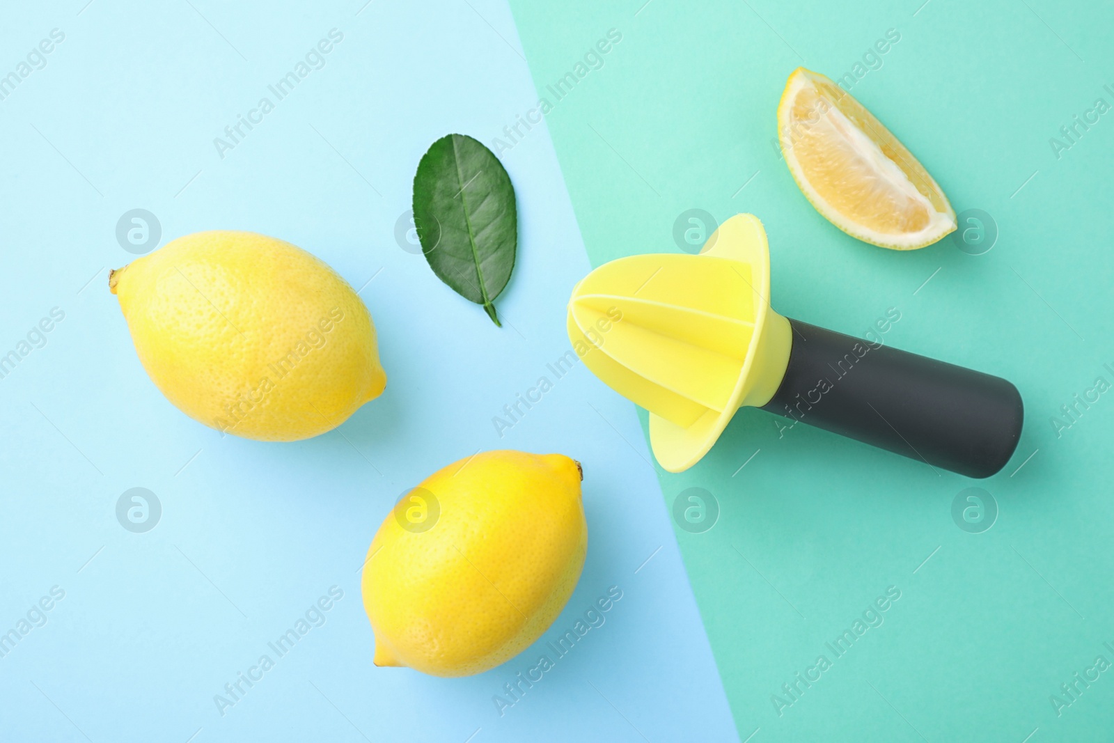 Photo of Flat lay composition with fresh lemons on color background