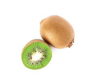 Photo of Cut and whole fresh kiwis on white background, top view